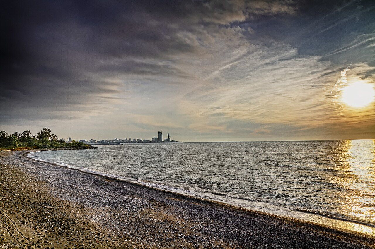 Batumi beach with the city skyline on the horizon