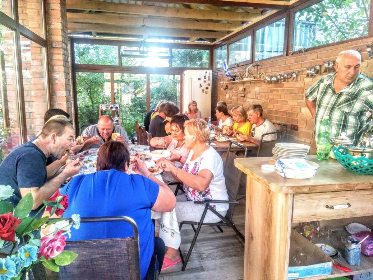 Guests at dinner on the terrace